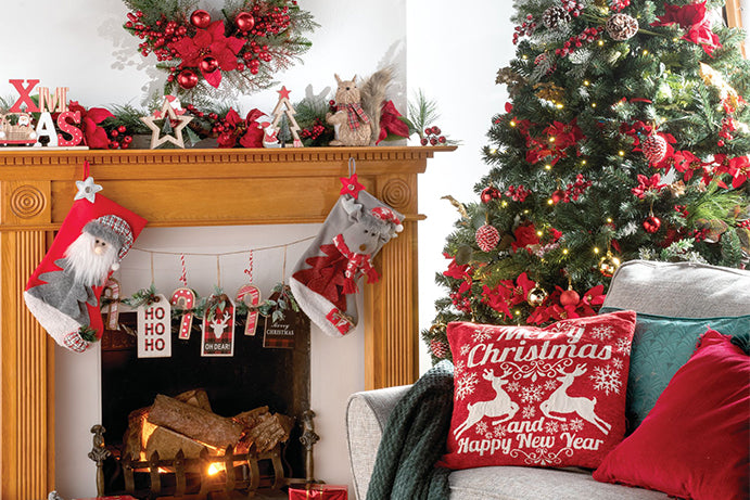 Living room at Christmas time in traditional red colours