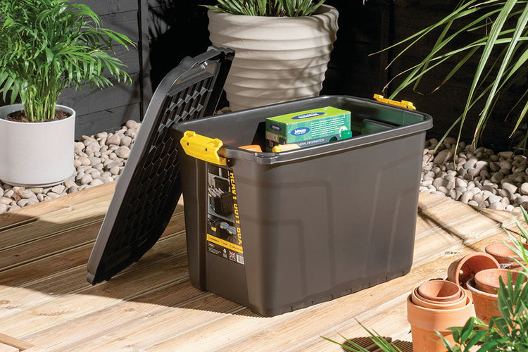 Large black storage box outside on a patio