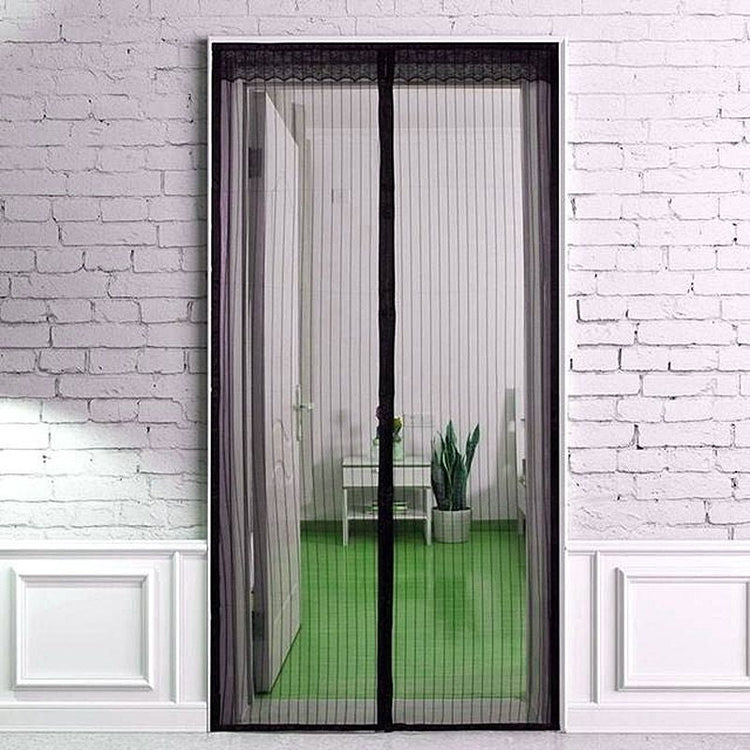 Black meshed fly curtain attached to a door, 