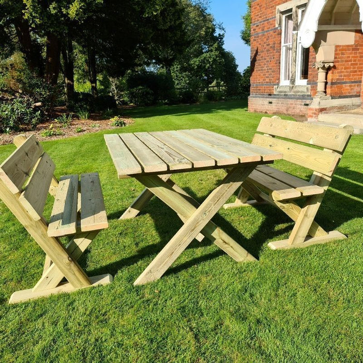 Wooden table and bench on a patio on a sunny day