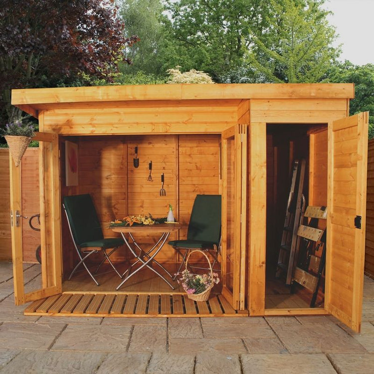 Large wooden summer house with small table and chairs, and storage solutions, three door