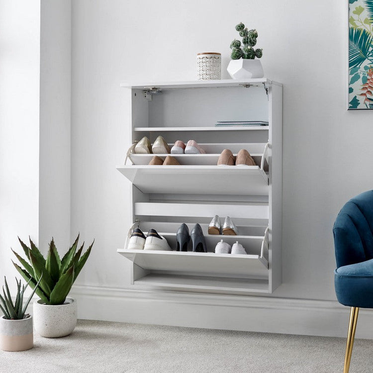 White wooden floating storage rack, three tier with space on top for holding a small plant