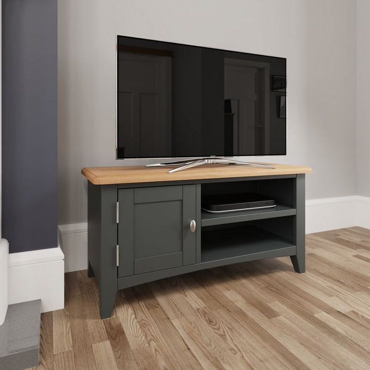 Black and wooden tv unit with a small television placed on top