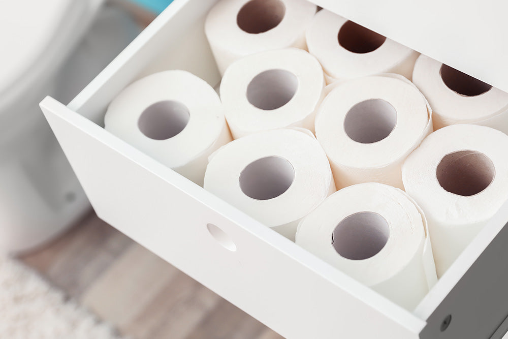 Toilet tissue in a wooden drawer