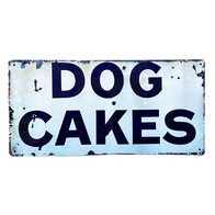 See more information about the Dog Cakes Sign Metal Wall Mounted - 30cm