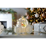 See more information about the LED Christmas Swirling Glitter Carriage - 21.5cm